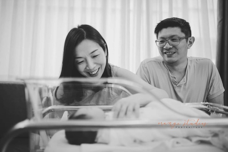 mummy looking at her newborn baby during fresh48