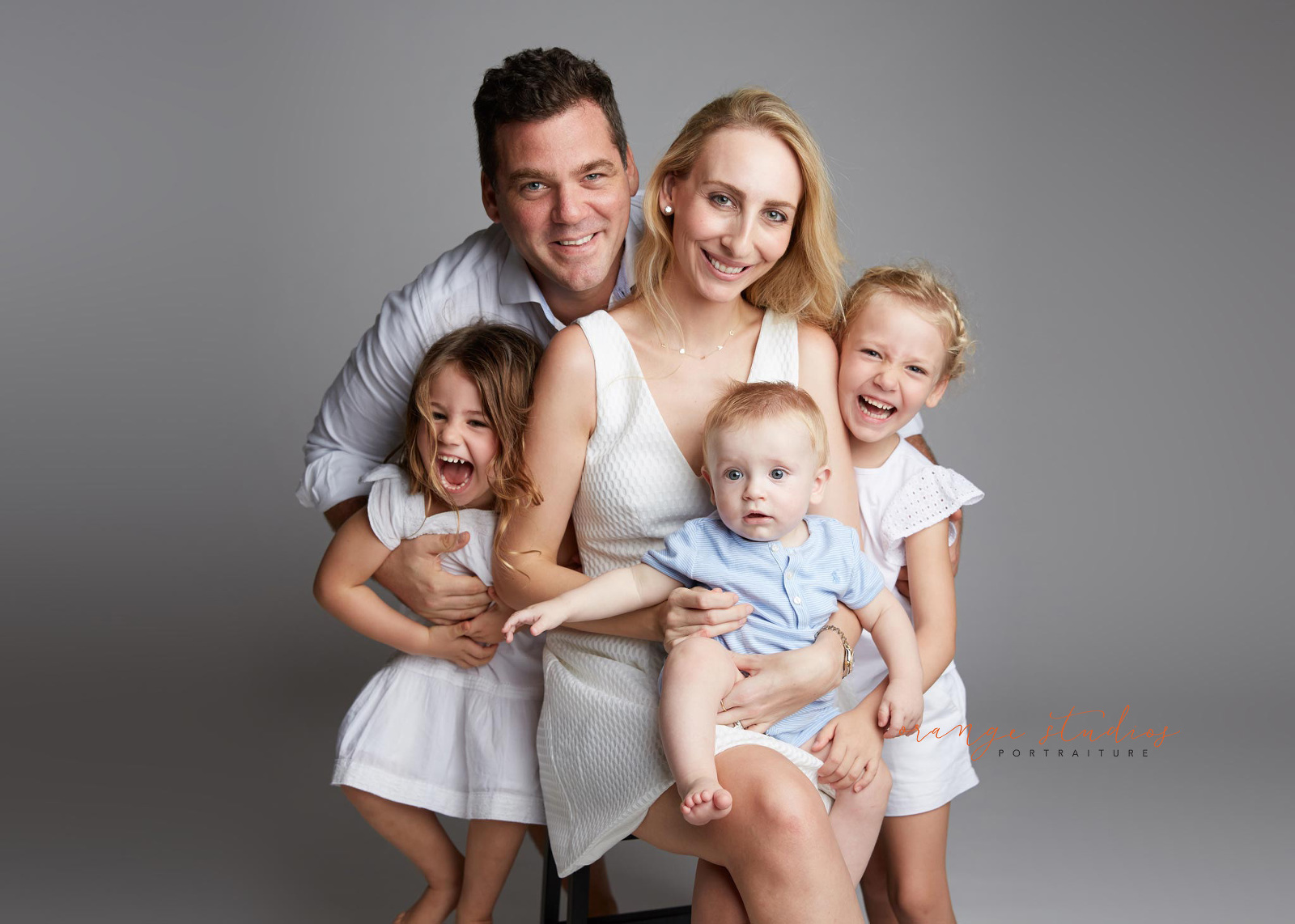 family of 5 fun portraits in singapore photo studio