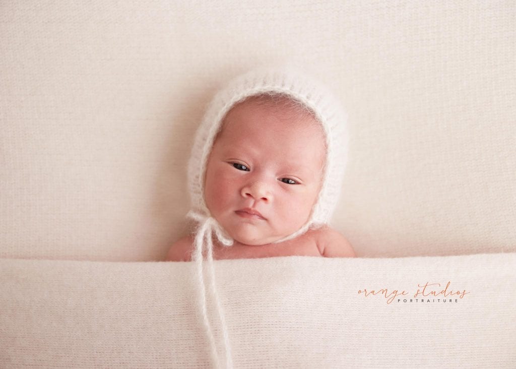 15 days old awake baby girl newborn portraits in singapore studio