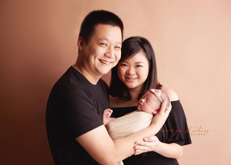 15 days old baby girl newborn portraits with parents in singapore studio