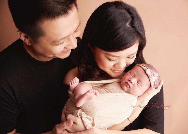 15 days old baby girl newborn portraits with parents in singapore studio