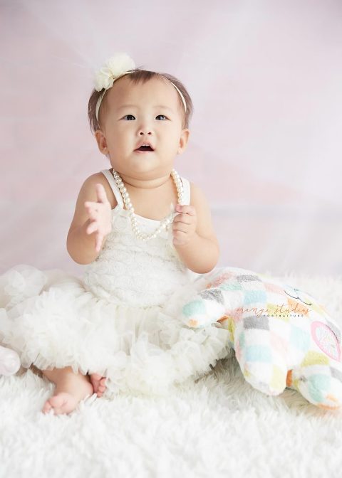 one year old baby girl portraits in singapore studio natural light