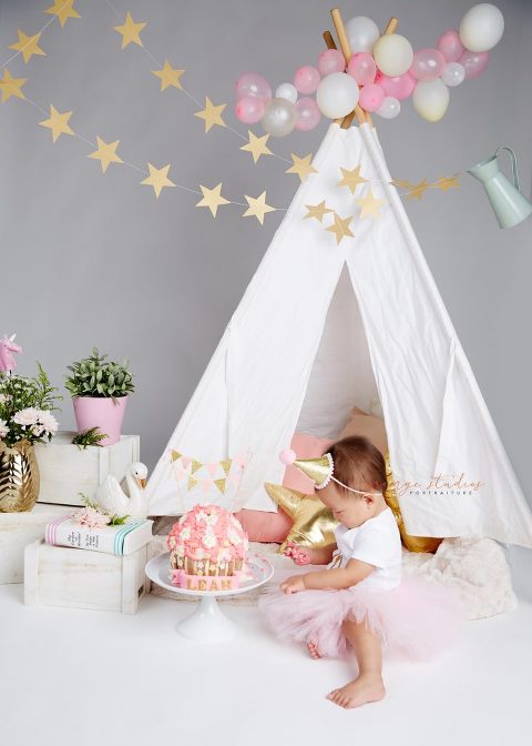 one year old baby girl cake smash portraits in singapore studio