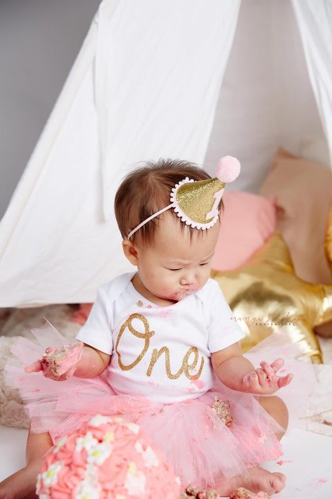 one year old baby girl cake smash portraits in singapore studio