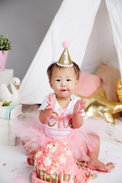 one year old baby girl cake smash portraits in singapore studio