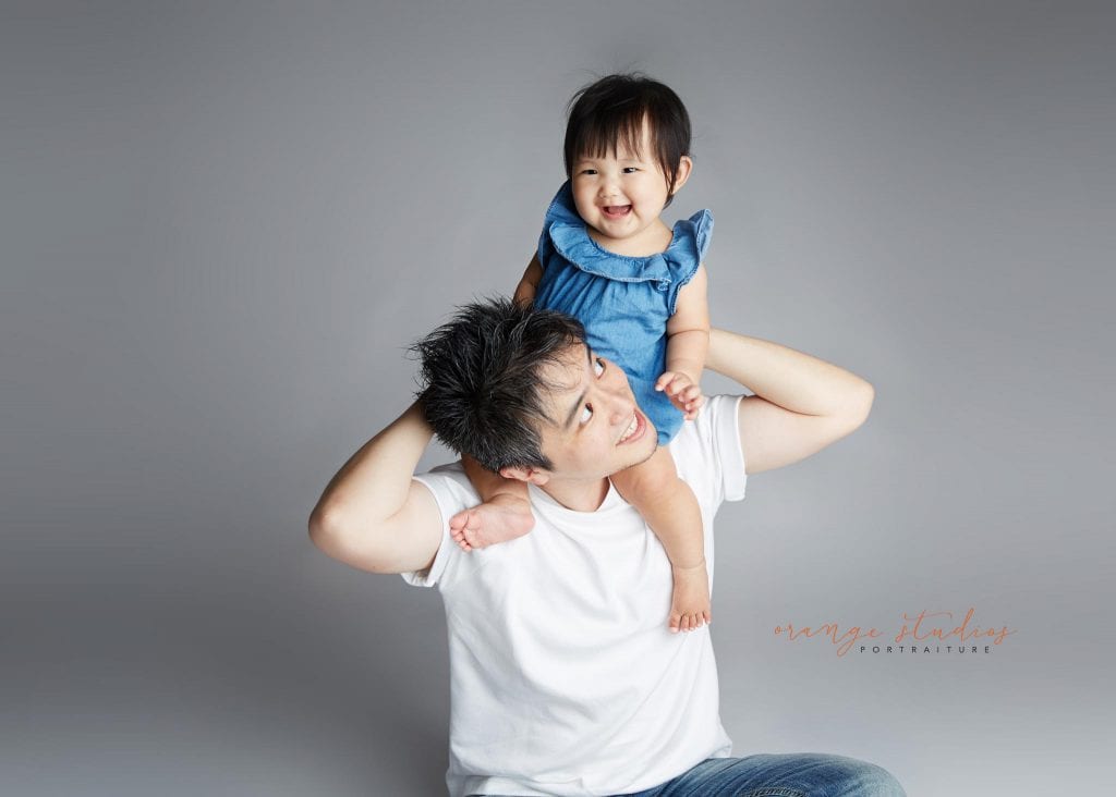 dad and baby family portraits in singapore studio