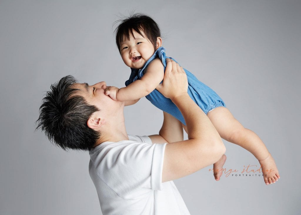 dad and baby family portraits in singapore studio