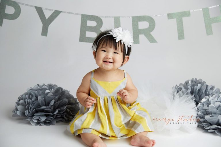 one year old baby girl cake smash portraits in singapore studio