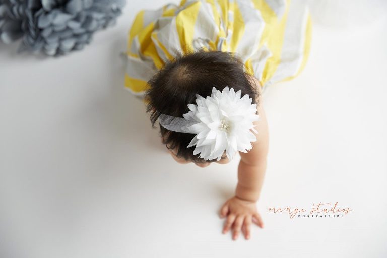 one year old baby girl cake smash portraits in singapore studio