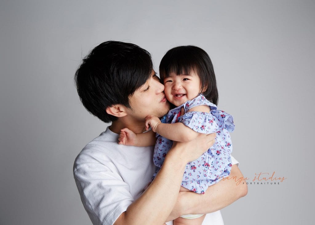 dad and baby family portraits in singapore studio