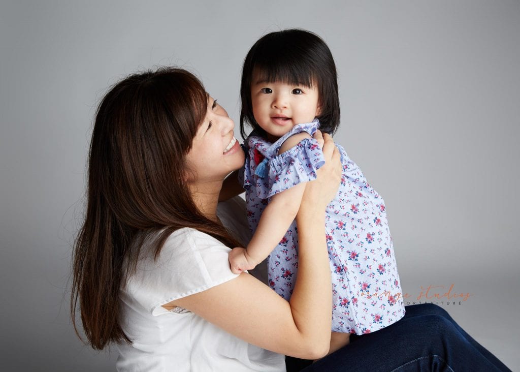 mum and baby family portraits in singapore studio