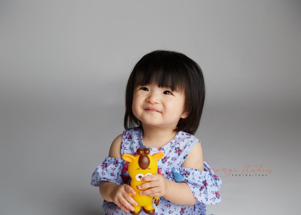 one year old baby girl portraits in singapore studio