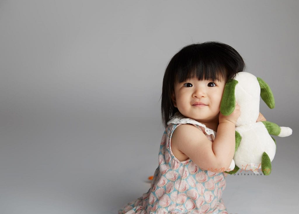 one year old baby girl portraits in singapore studio