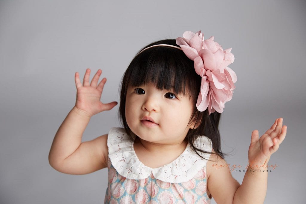 one year old baby girl portraits in singapore studio