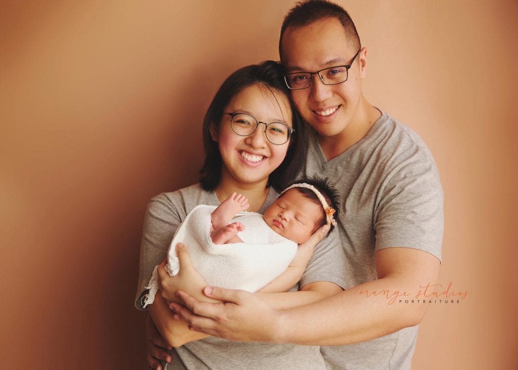 13 days old baby girl newborn portraits with parents in singapore studio