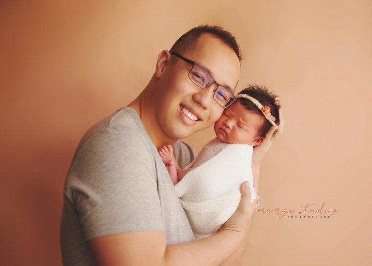 13 days old baby girl newborn portraits with dad in singapore studio