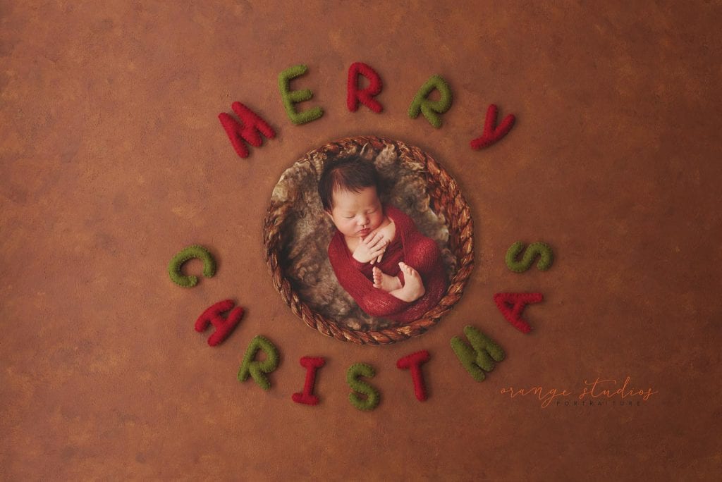 13 days old baby girl newborn christmas portraits in singapore studio
