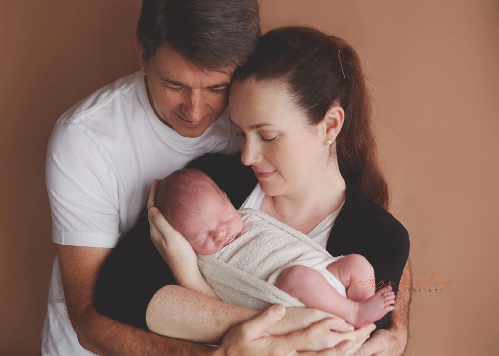 11 days old baby boy newborn portraits with parents in singapore studio