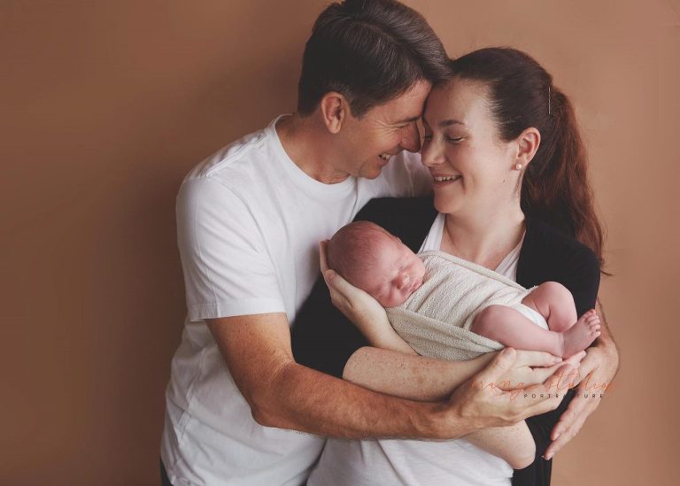 11 days old baby boy newborn portraits with parents in singapore studio
