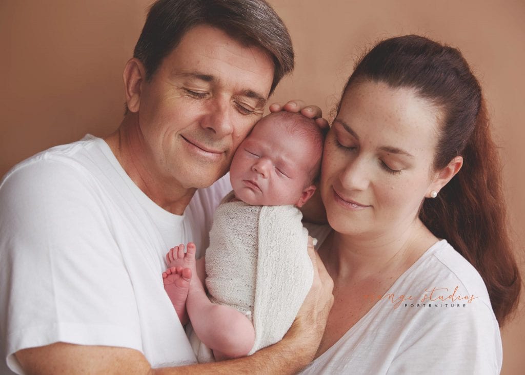 11 days old baby boy newborn portraits with parents in singapore studio