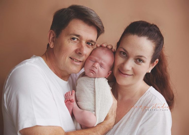 11 days old baby boy newborn portraits with parents in singapore studio