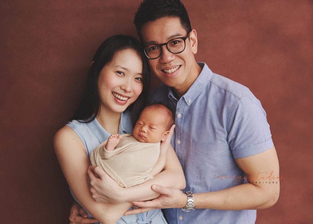 14 days old baby boy newborn portraits with parents in singapore studio