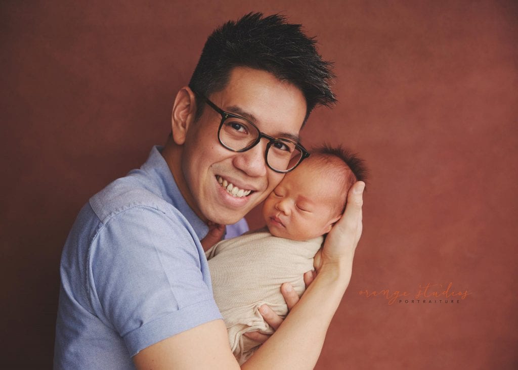14 days old baby boy newborn portraits with dad in singapore studio