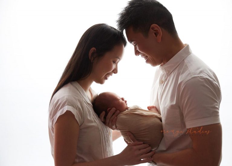 14 days old baby boy newborn portraits with parents in singapore studio
