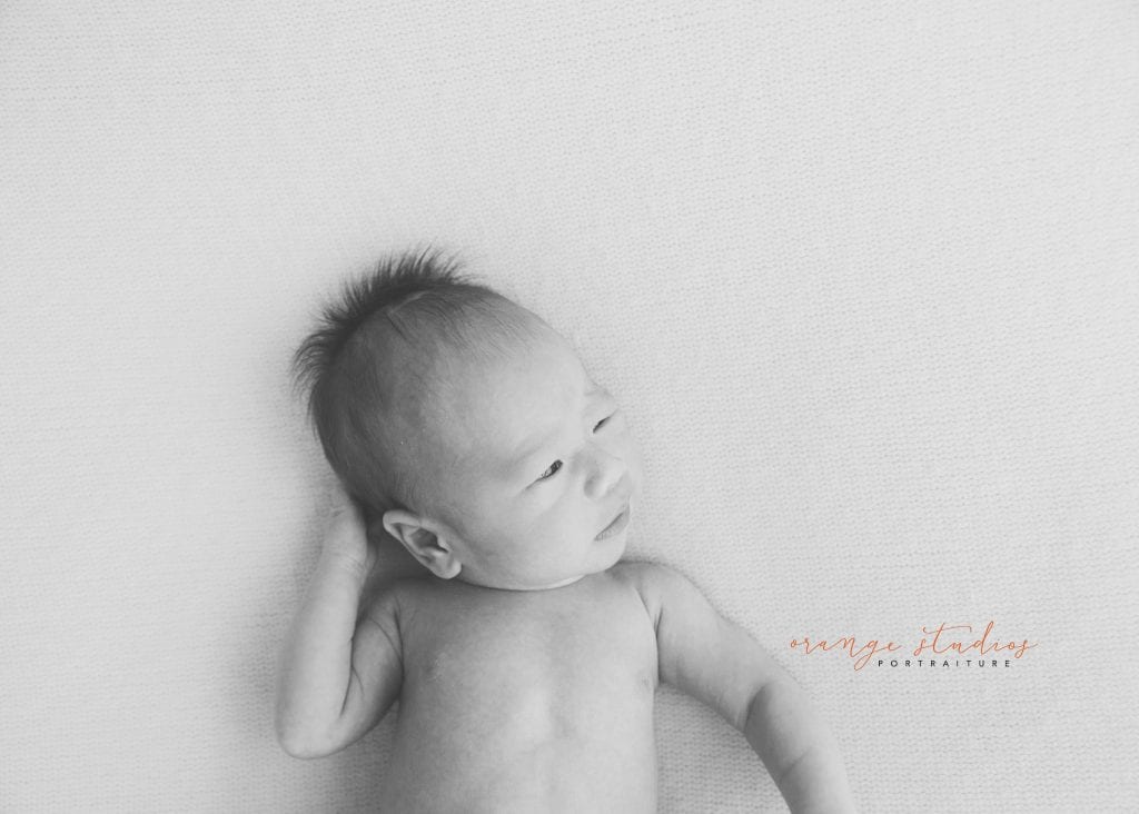 14 days old baby boy black and white natural newborn portraits in singapore studio