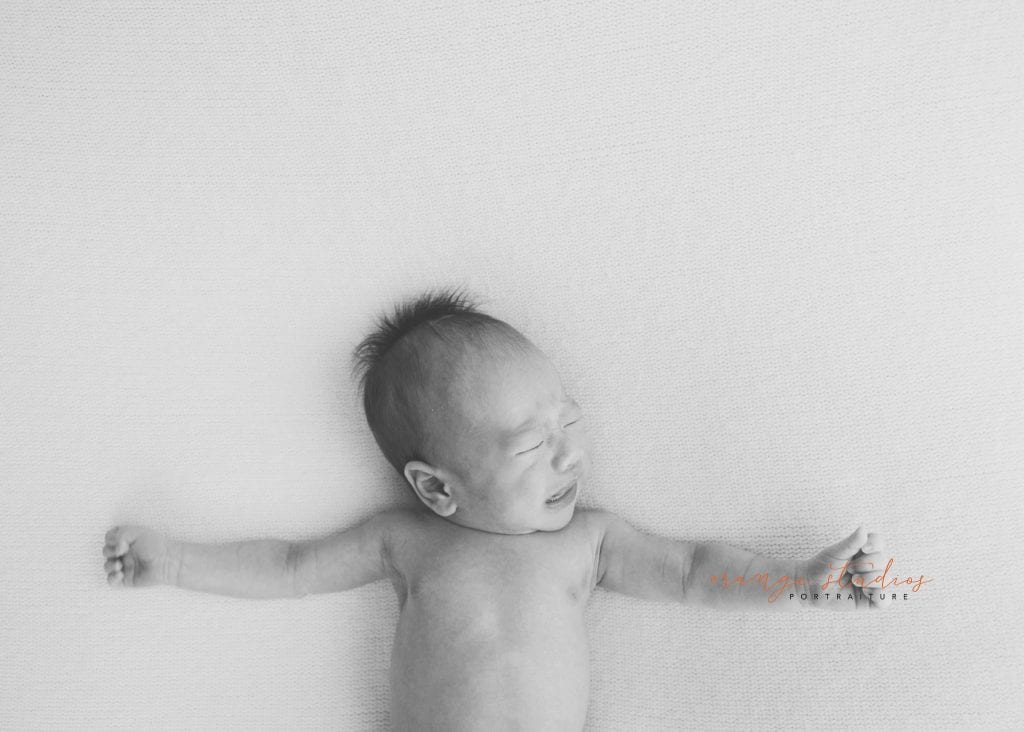 14 days old baby boy black and white natural newborn portraits in singapore studio