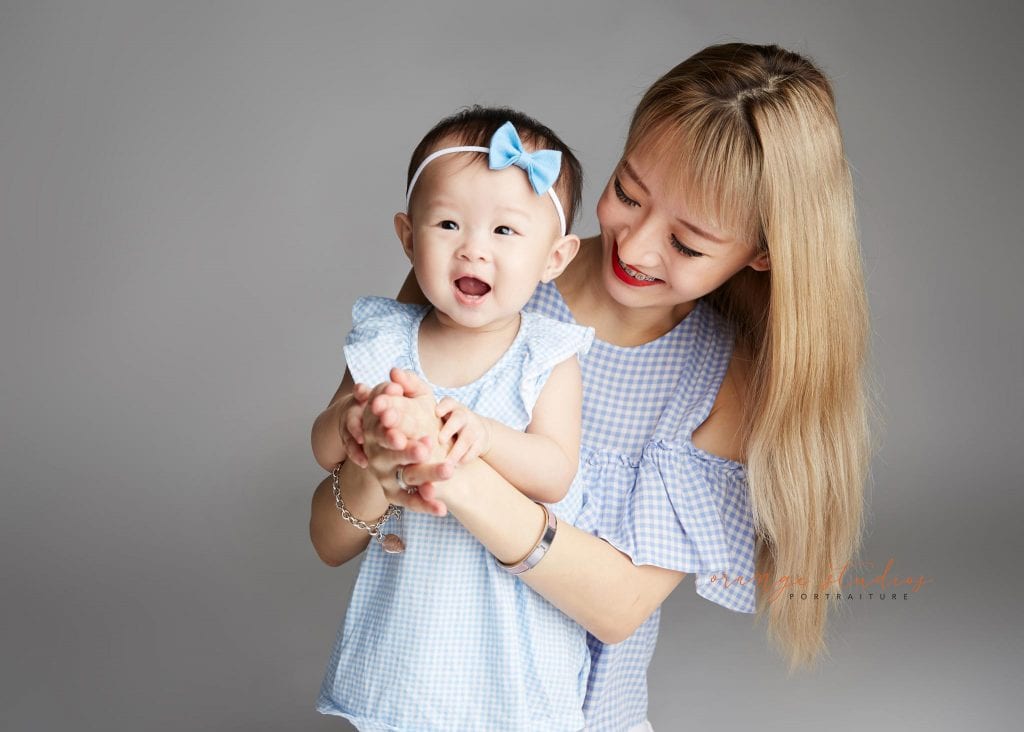 mum and baby family portraits in singapore studio