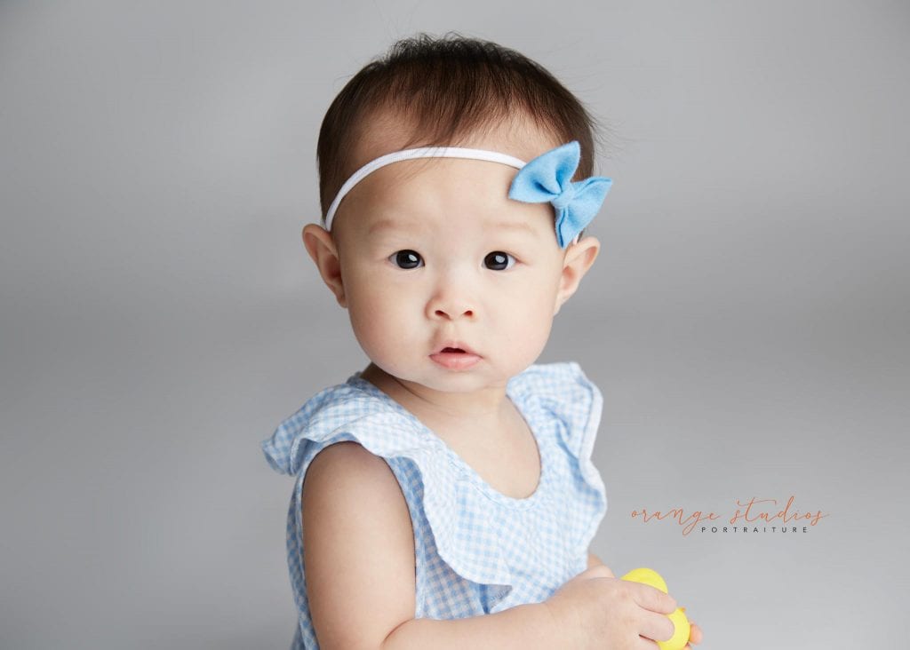 one year old baby girl portraits in singapore studio