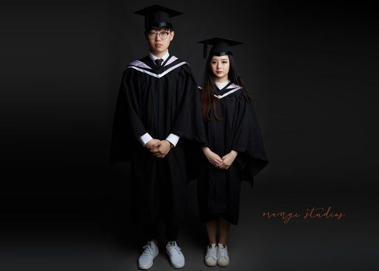 natural and fun graduation couple portraits in singapore studio