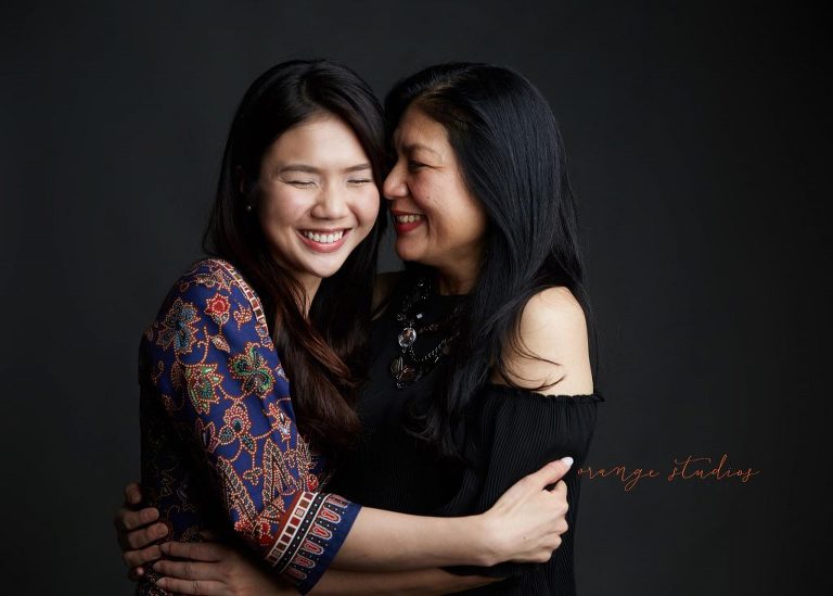 natural and fun mum and daughter family portraits in singapore studio