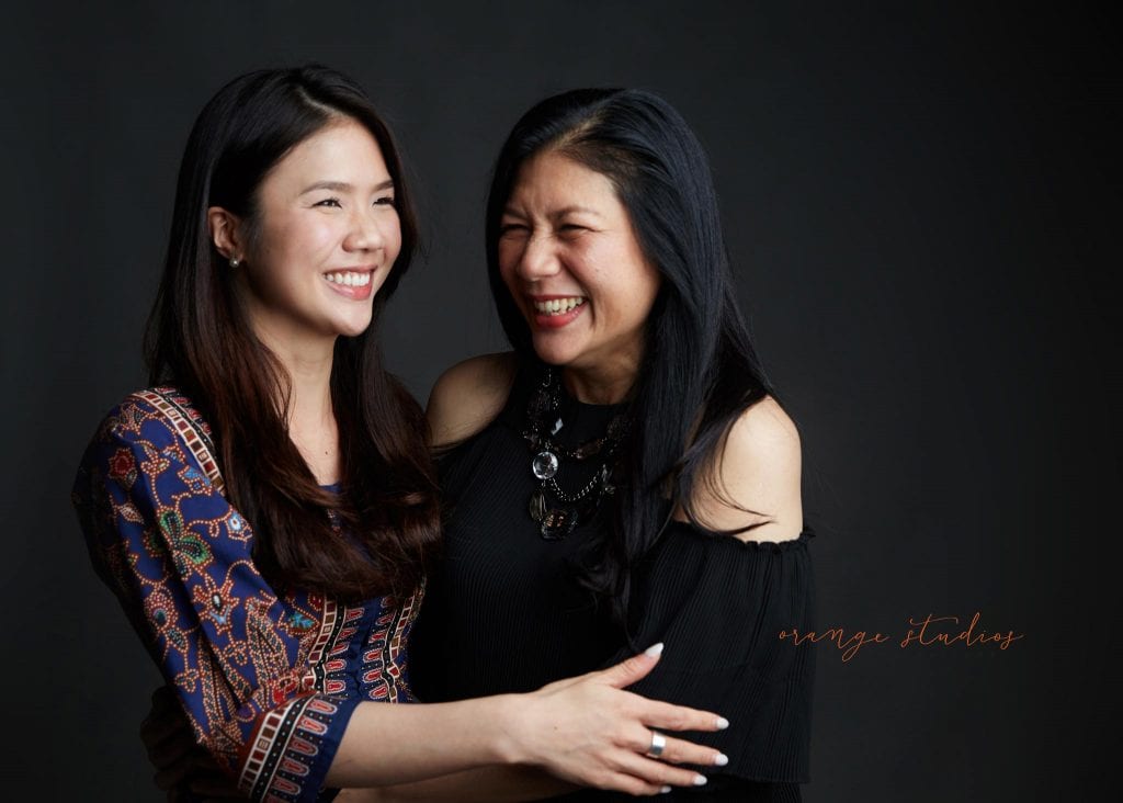 natural and fun mum and daughter family portraits in singapore studio