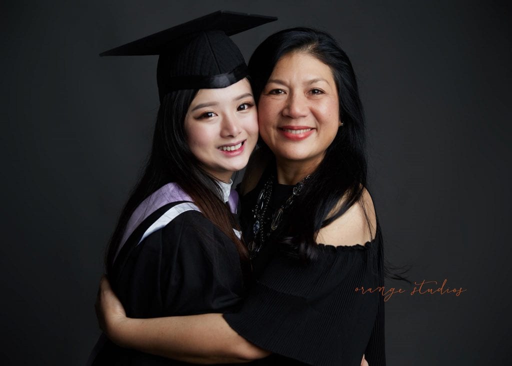 natural and fun mum and daughter graduation family portraits in singapore studio