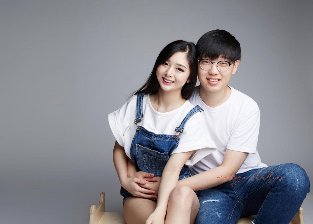 natural and fun couple portraits with in singapore studio