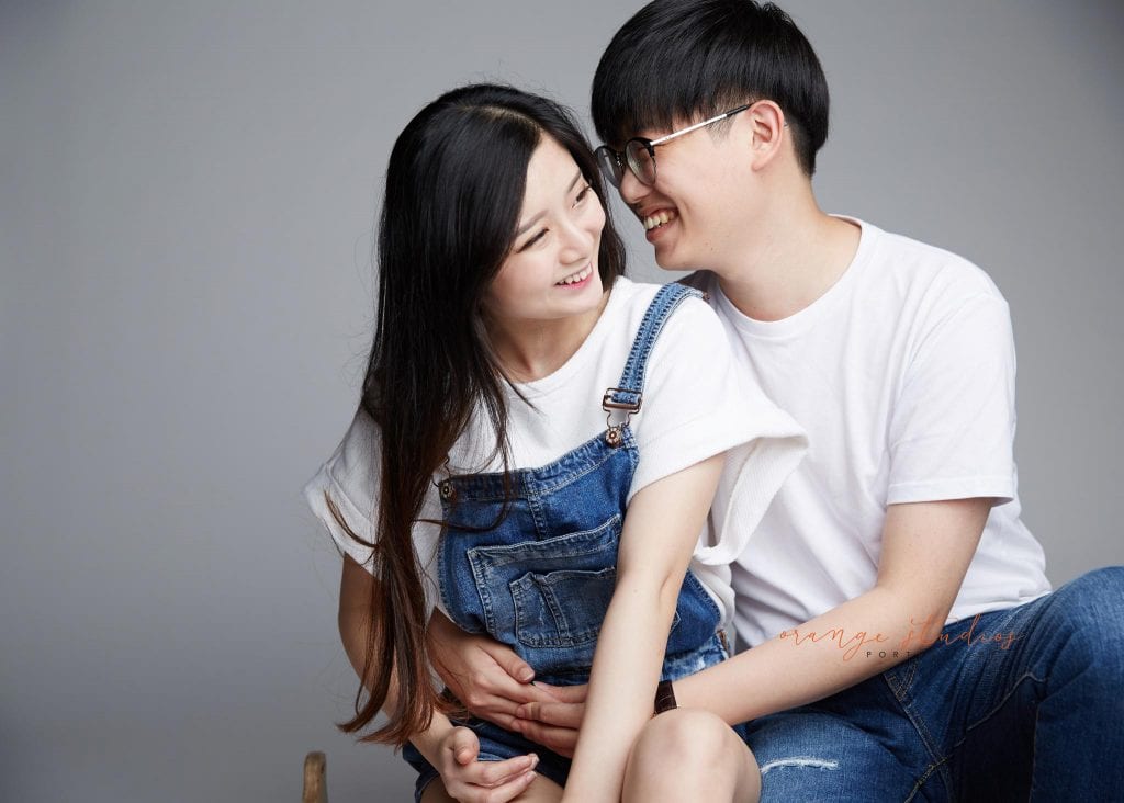 natural and fun couple portraits with in singapore studio