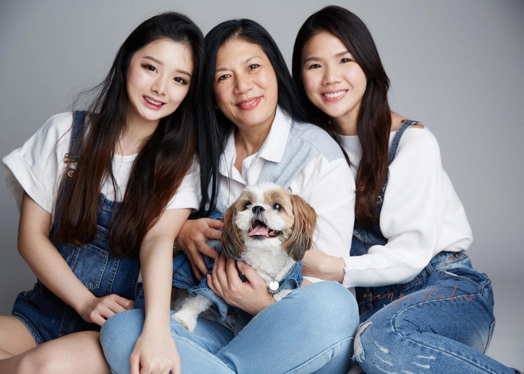 natural and fun family portraits with pet dog in singapore studio