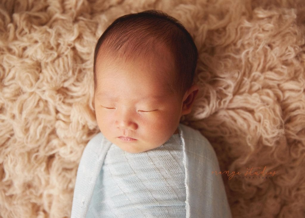 8 days old baby boy natural newborn portraits in singapore studio