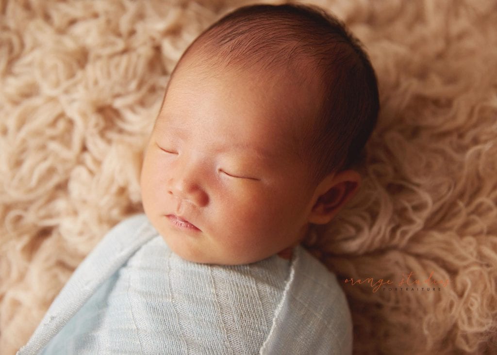8 days old baby boy natural newborn portraits in singapore studio