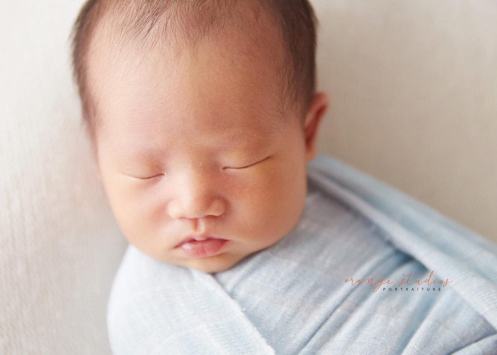 8 days old baby boy natural newborn portraits in singapore studio