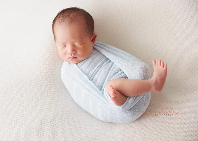 8 days old baby boy natural newborn portraits in singapore studio