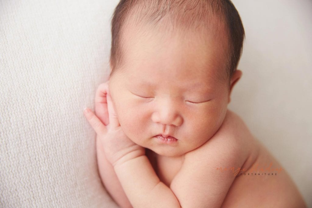 8 days old baby boy natural newborn portraits in singapore studio