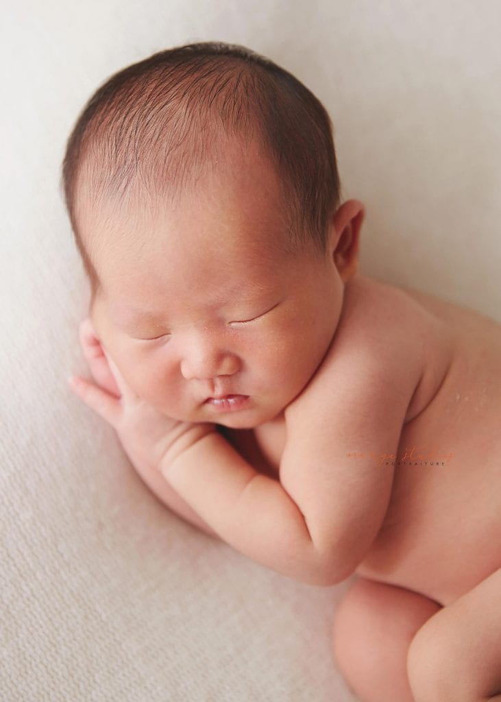 8 days old baby boy natural newborn portraits in singapore studio