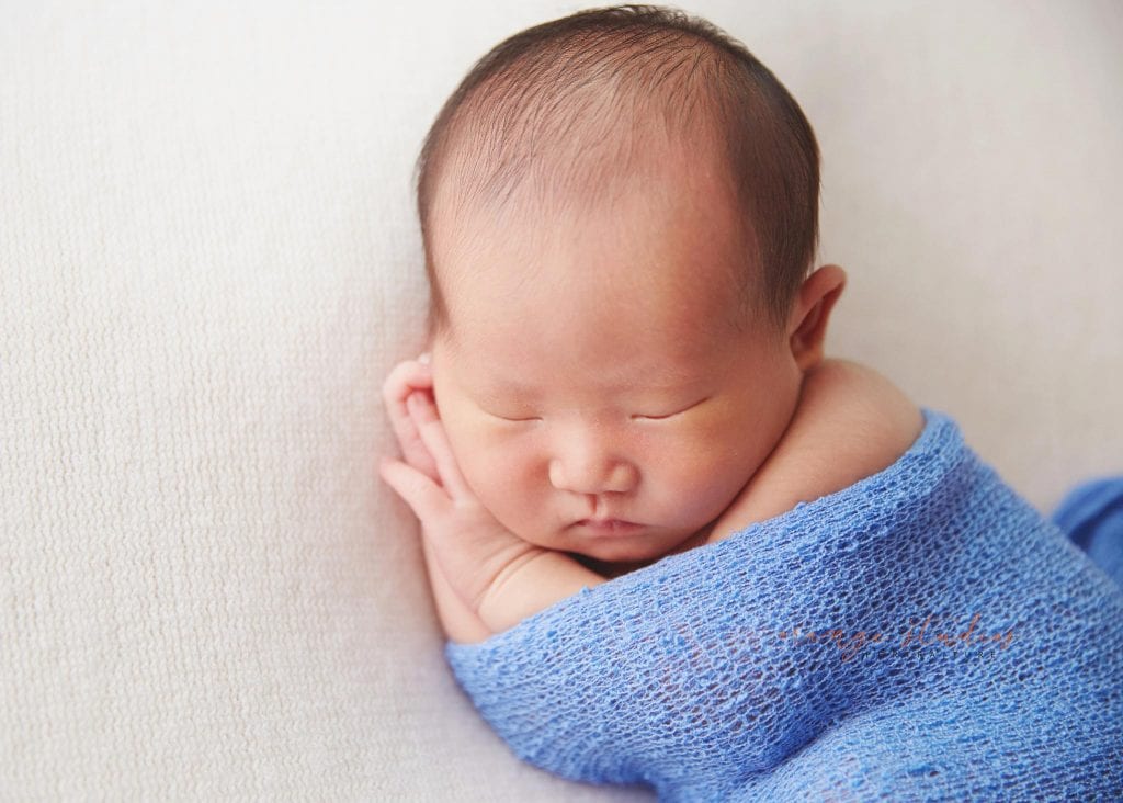8 days old baby boy natural newborn portraits in singapore studio