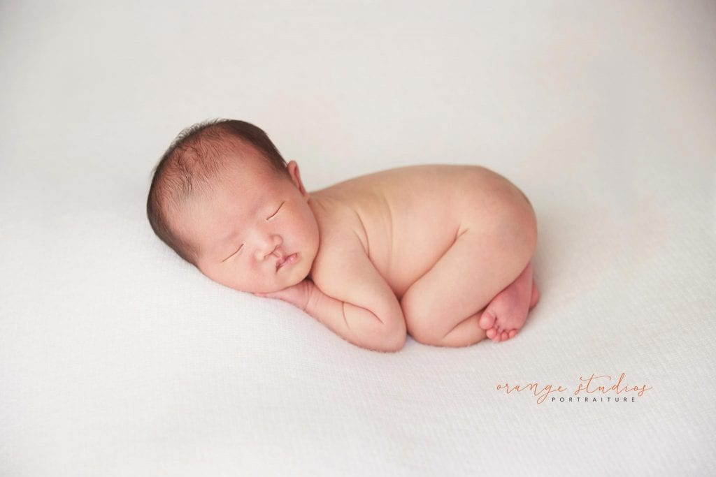 8 days old baby boy natural newborn portraits in singapore studio