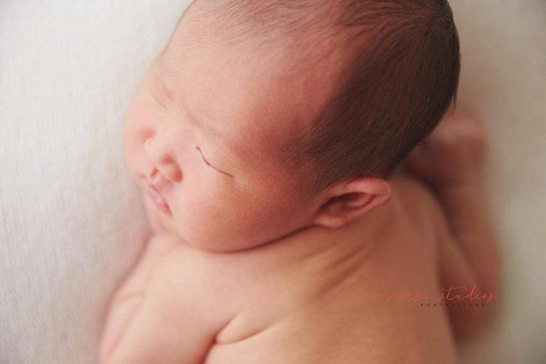 8 days old baby boy natural newborn portraits in singapore studio