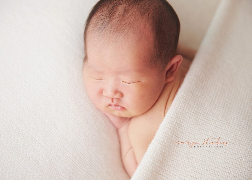 8 days old baby boy natural newborn portraits in singapore studio
