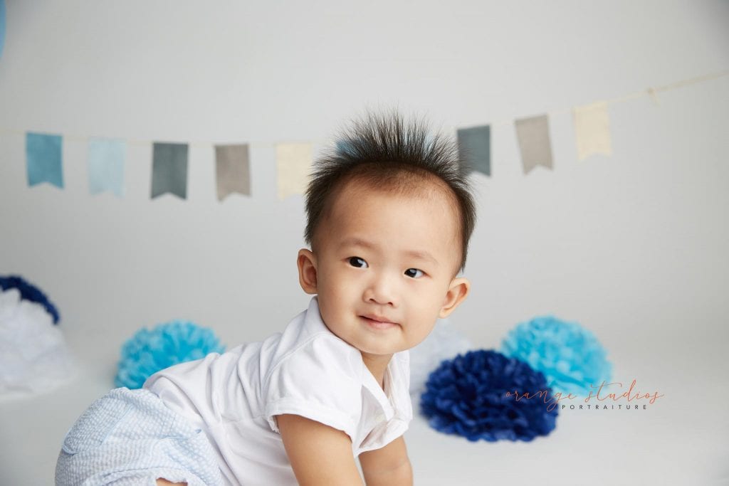 one year old baby boy cake smash portraits in singapore studio